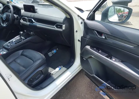 2021 Mazda Cx-5 Grand Touring z USA, uszkodzony, nr VIN JM3KFBDM7M0434929